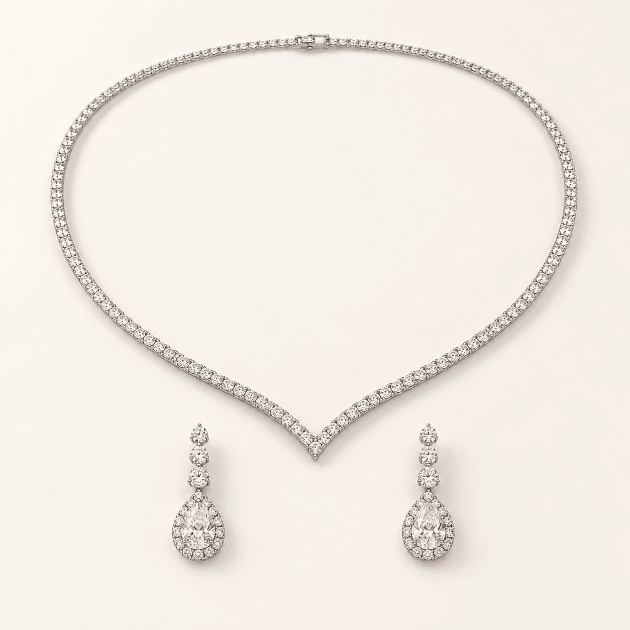 Full set of the V-line natural-diamond bridal necklace and matching earrings in white gold