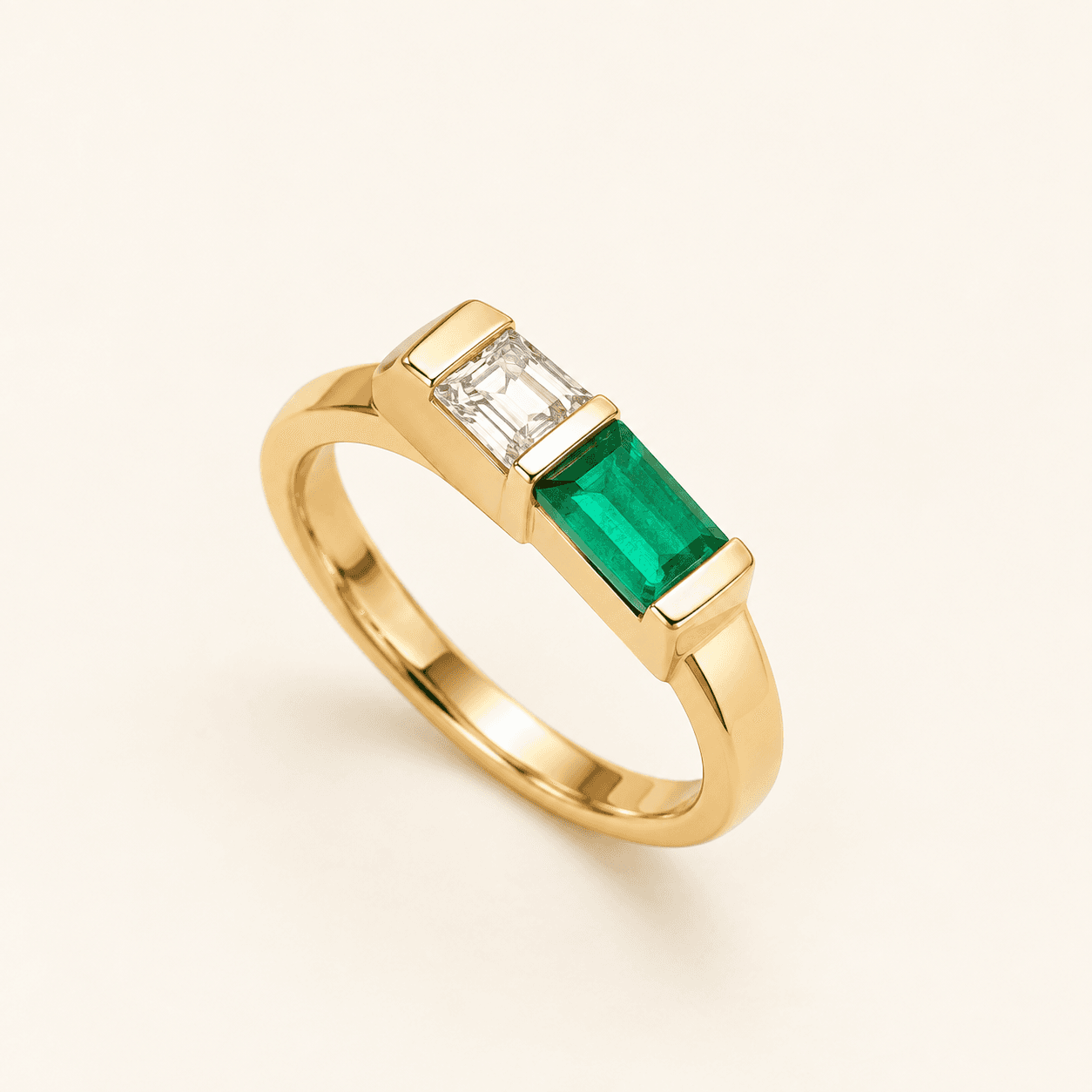 Front of the natural emerald and diamond pinky ring in yellow gold